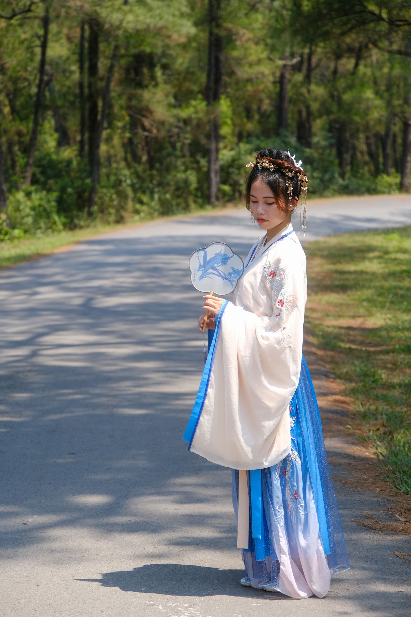 Woman in serene traditional Hanfu portrait in soft daylight